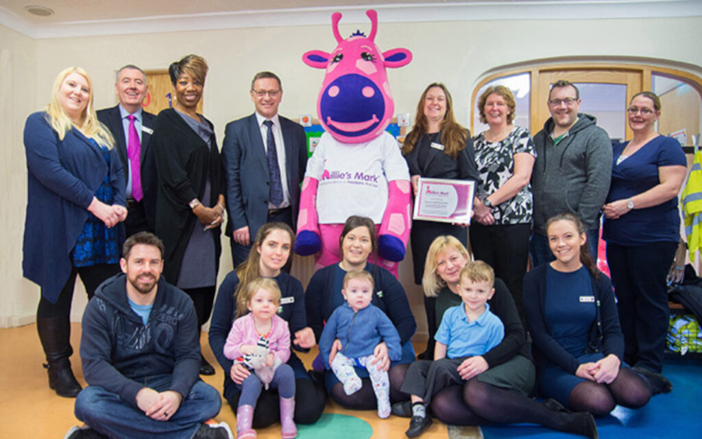 Millie the giraffe visits nurseries across the country