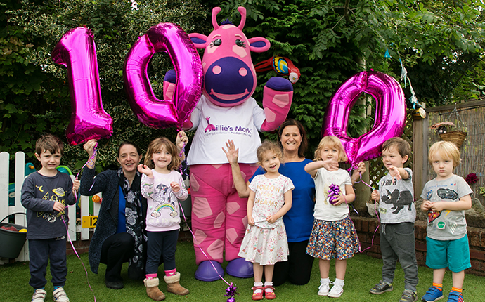 Millie Giraffe with the children and joint managers at Townhouse Private Day Nursery