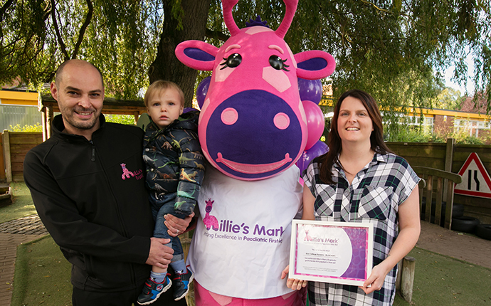 Joanne, Dan and Leo Thompson and Millie the giraffe